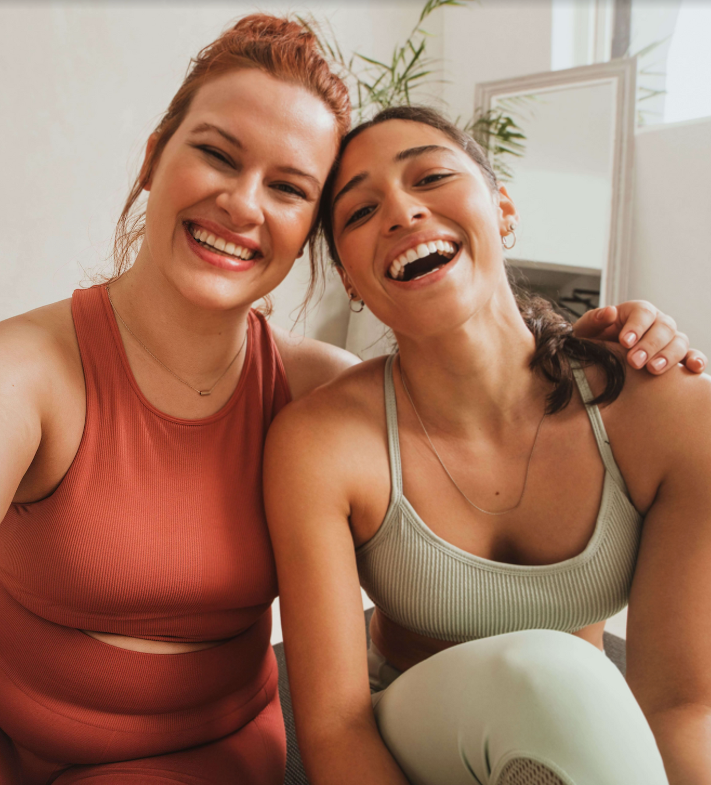 Two healthy women laughing